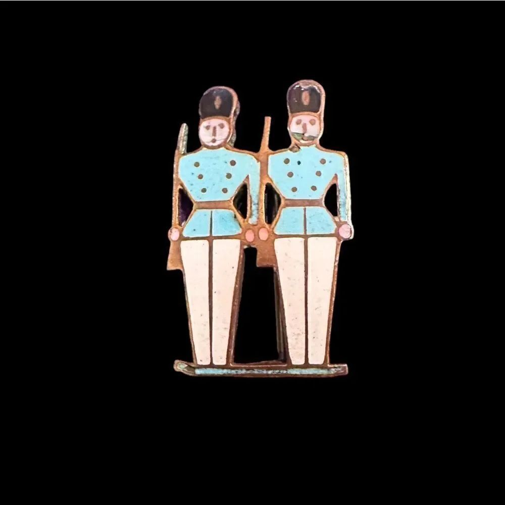 Vintage enamel on gold tone metal soldiers pin brooch
